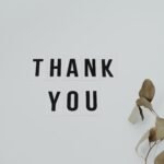 A minimalist thank you note with eucalyptus leaves, perfect for expressing gratitude.